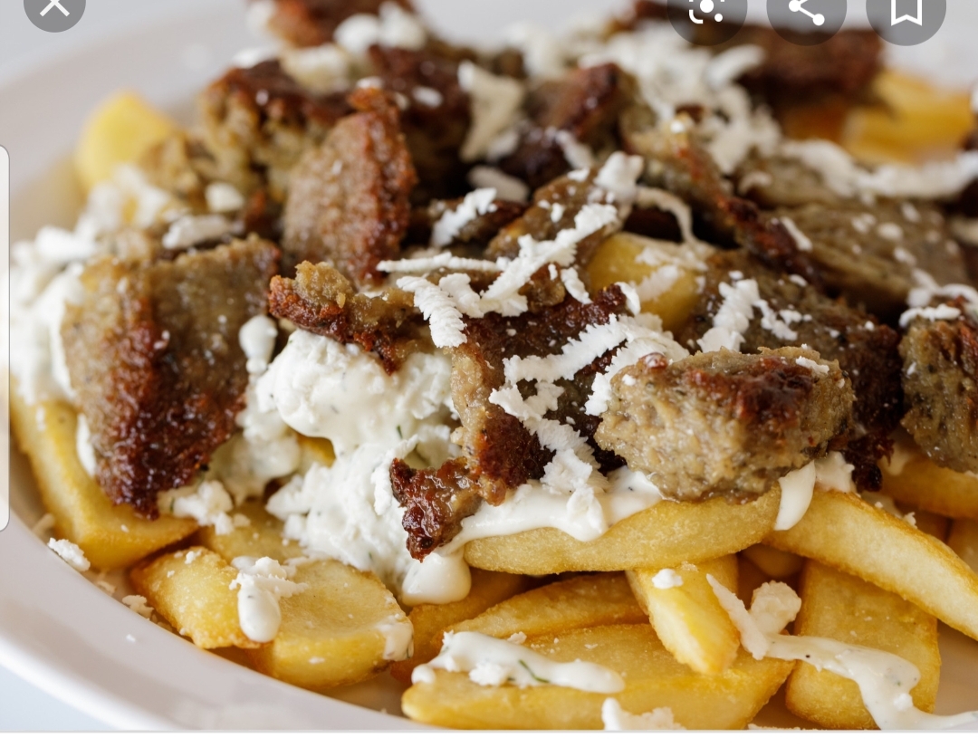 Order Gyro cheese fries food online from New Star Gyros store, Chicago on bringmethat.com