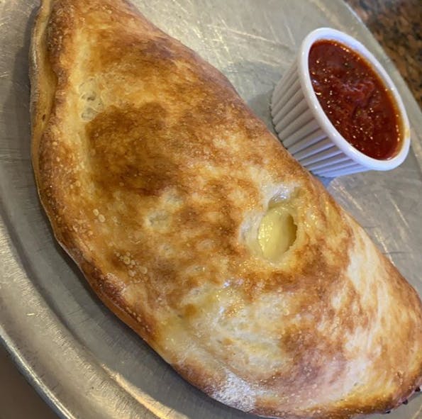 Order Spinach Calzone - Calzone food online from Bricklyn Pizza store, Brooklyn on bringmethat.com