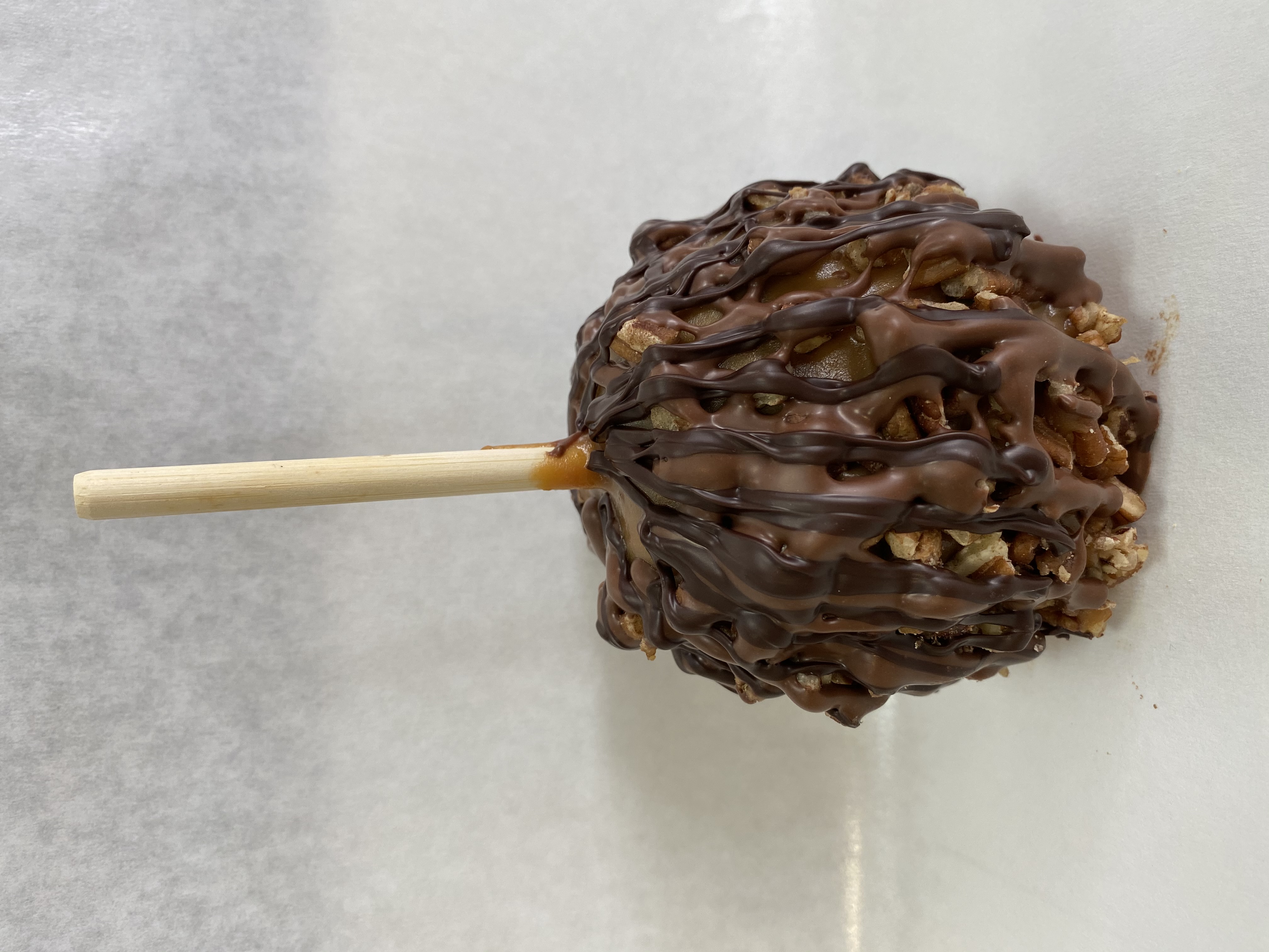 Order Monster Apple Caramel Apple food online from Rocky Mountain Chocolate Factory store, Irvine on bringmethat.com