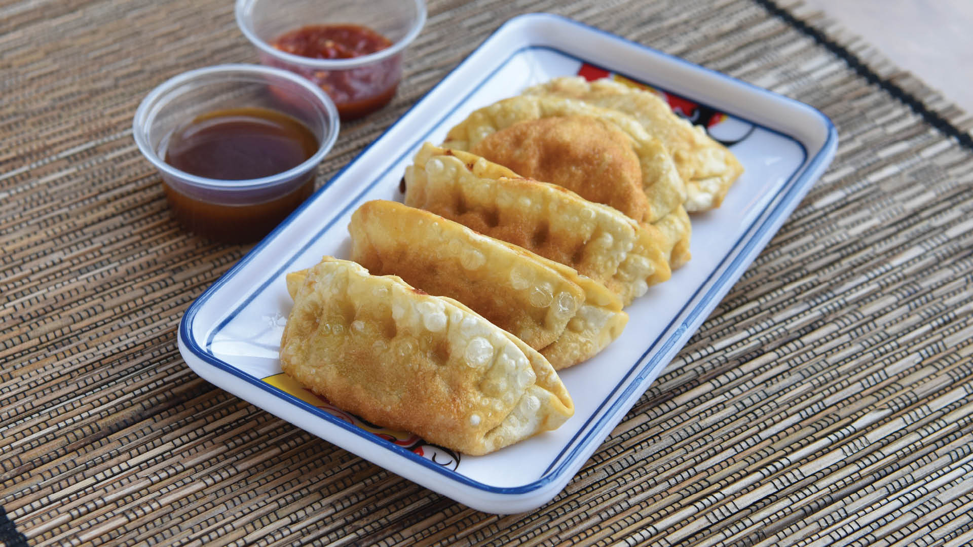 Order A6. Fried Dumpling food online from Fan T’Asia store, Atlanta on bringmethat.com