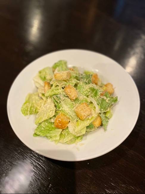 Order Caesar Salad food online from Raincross Pub + Kitchen store, Riverside on bringmethat.com