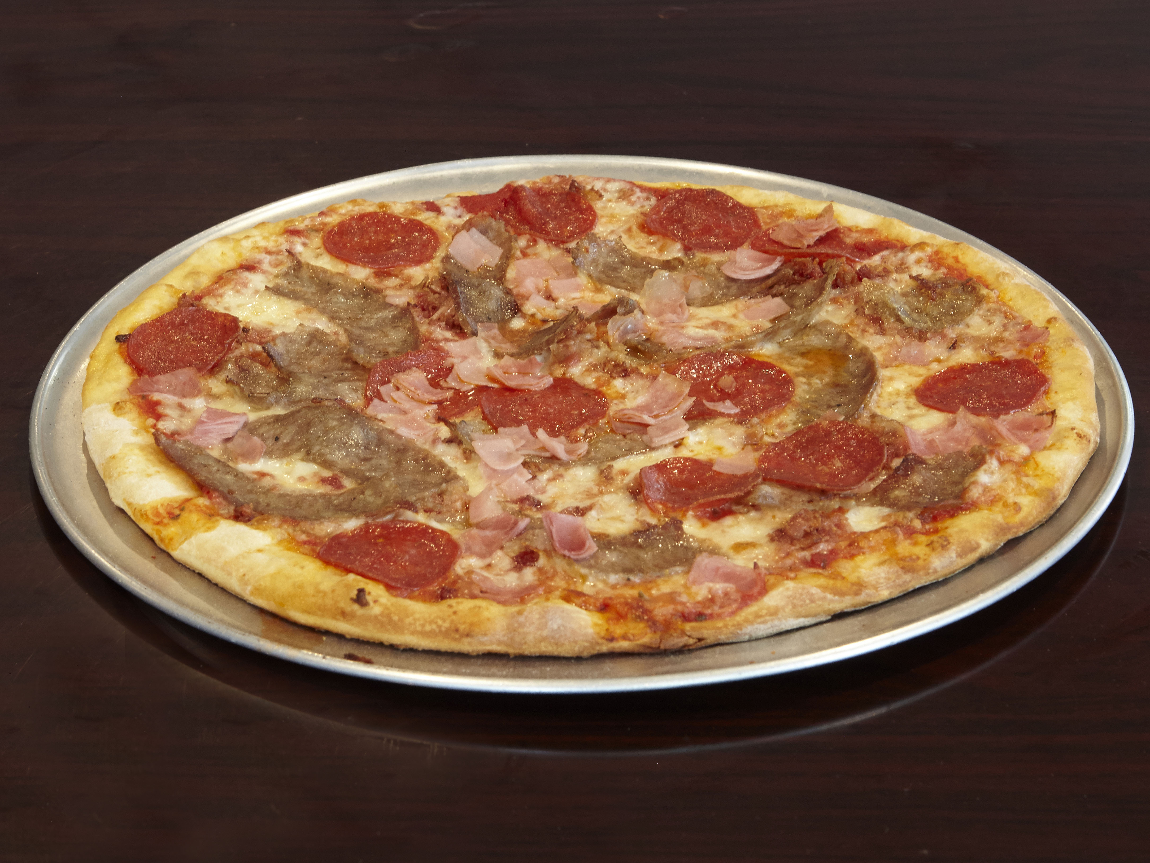 Order Meat Lovers Pizza food online from Giovanni's store, Blauvelt on bringmethat.com