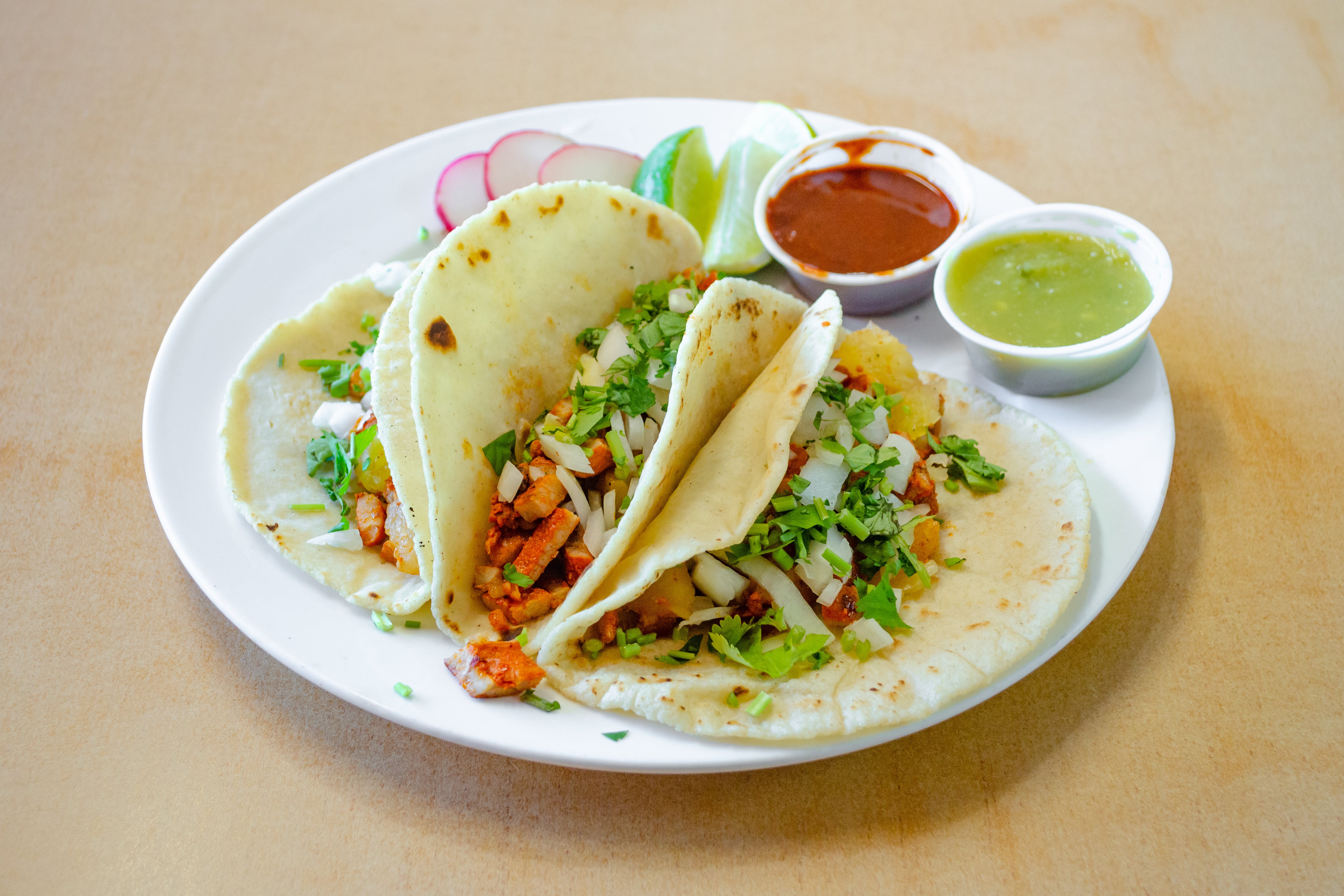 Order Al Pastor Taco - Taco food online from Ranchito Pizzeria & Mexican Restaurant store, Fords on bringmethat.com
