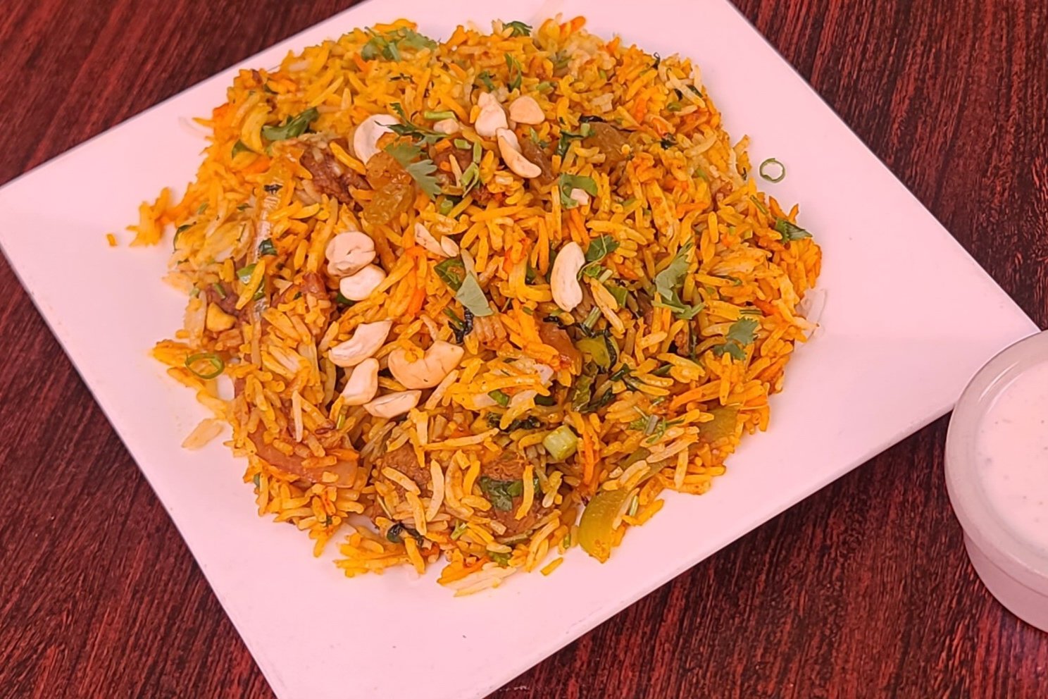 Order Lamb Biryani food online from Mission Curry House store, San Francisco on bringmethat.com