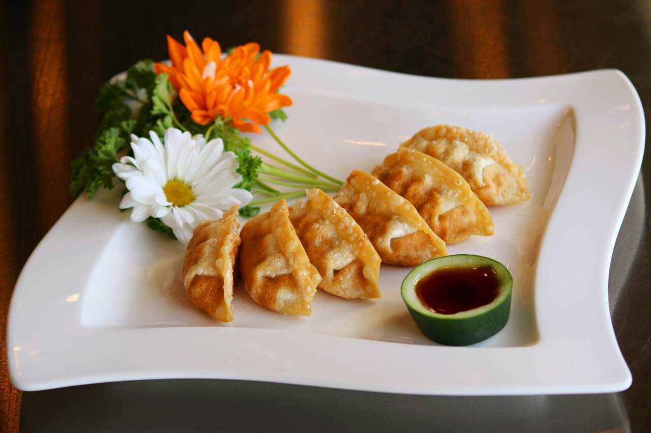 Order 6 Piece Fried Dumpling food online from Bento's Hibachi & Sushi Express store, Gambrills on bringmethat.com