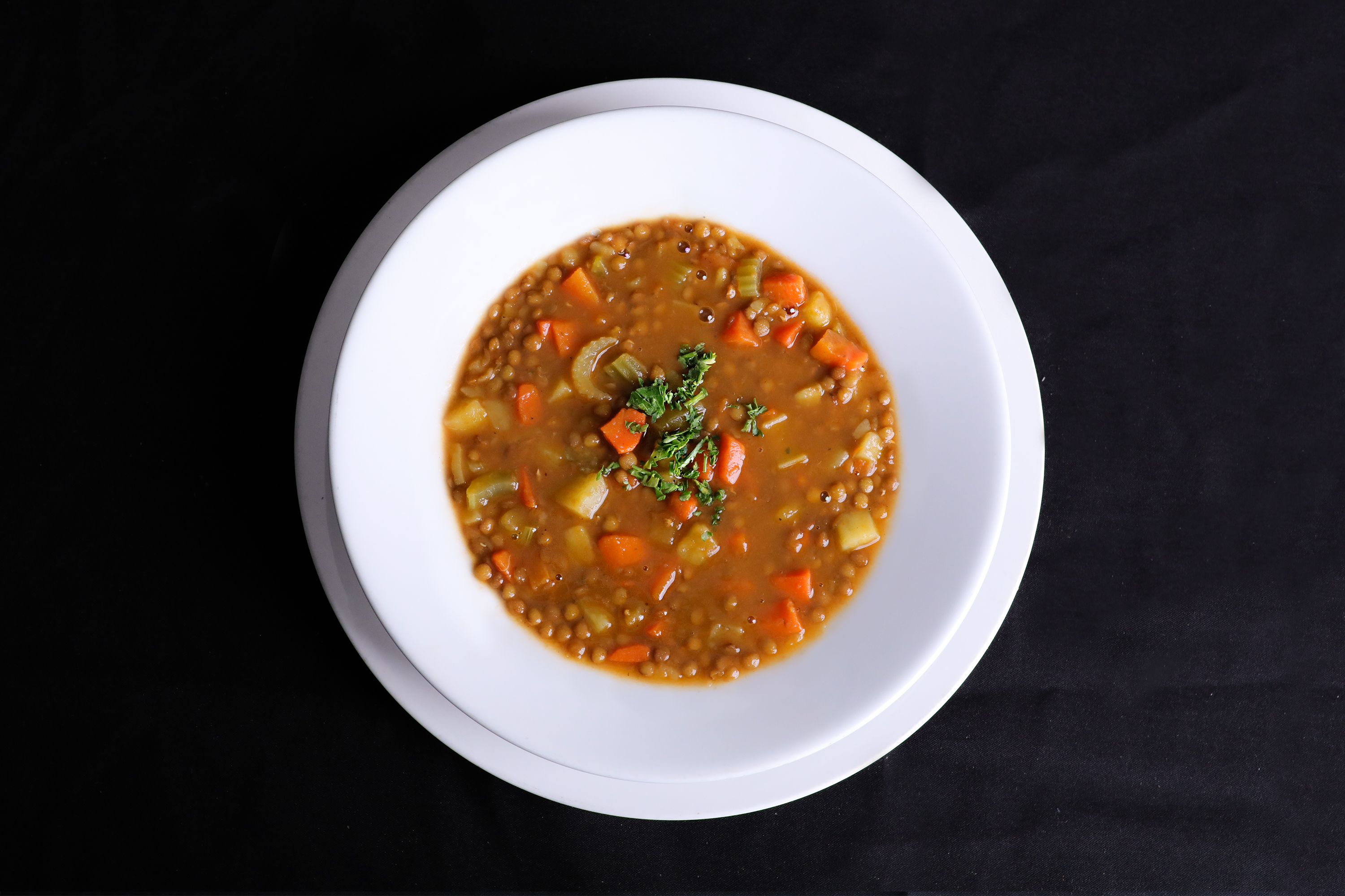 Order Homemade Lentil Soup food online from Port Restaurant & Bar store, Corona Del Mar on bringmethat.com