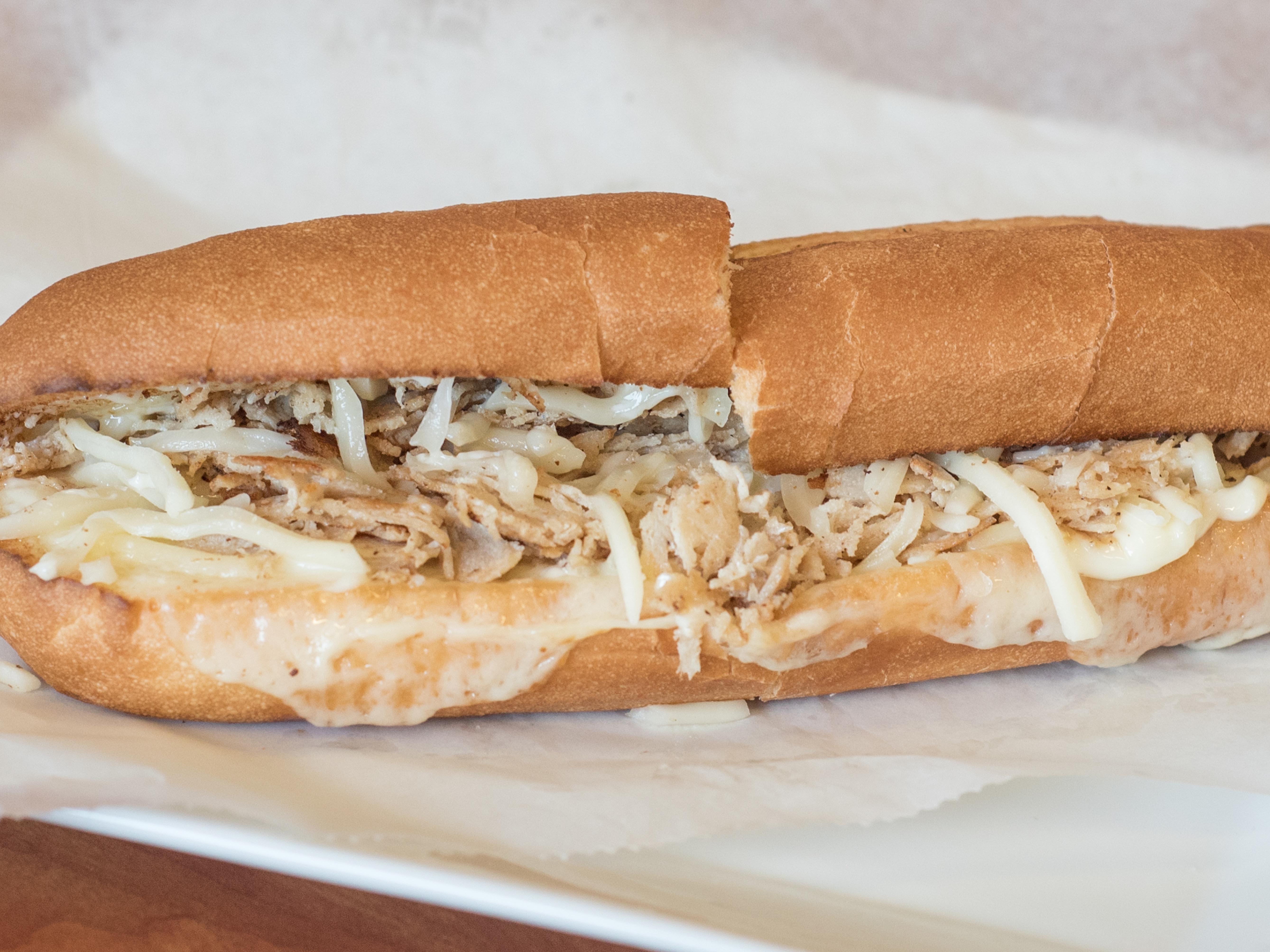 Order Chicken Steak Sub food online from Carini's Pizza store, Severna Park on bringmethat.com