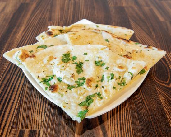 Order Garlic Naan food online from Bawarchi Indian Cuisine store, Hoover on bringmethat.com