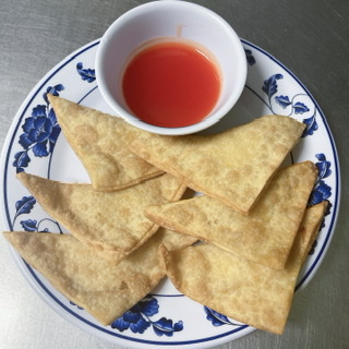 Order Crabmeat Cheese Rangoon food online from China Wok store, Colorado Springs on bringmethat.com