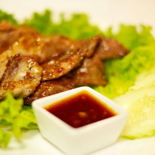Order Grilled Pork food online from Thai Green Village store, Frisco on bringmethat.com