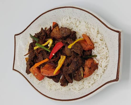 Order RIBEYE TIBS WITH RICE food online from Kategna Ethiopia Cusine store, Brookhaven on bringmethat.com