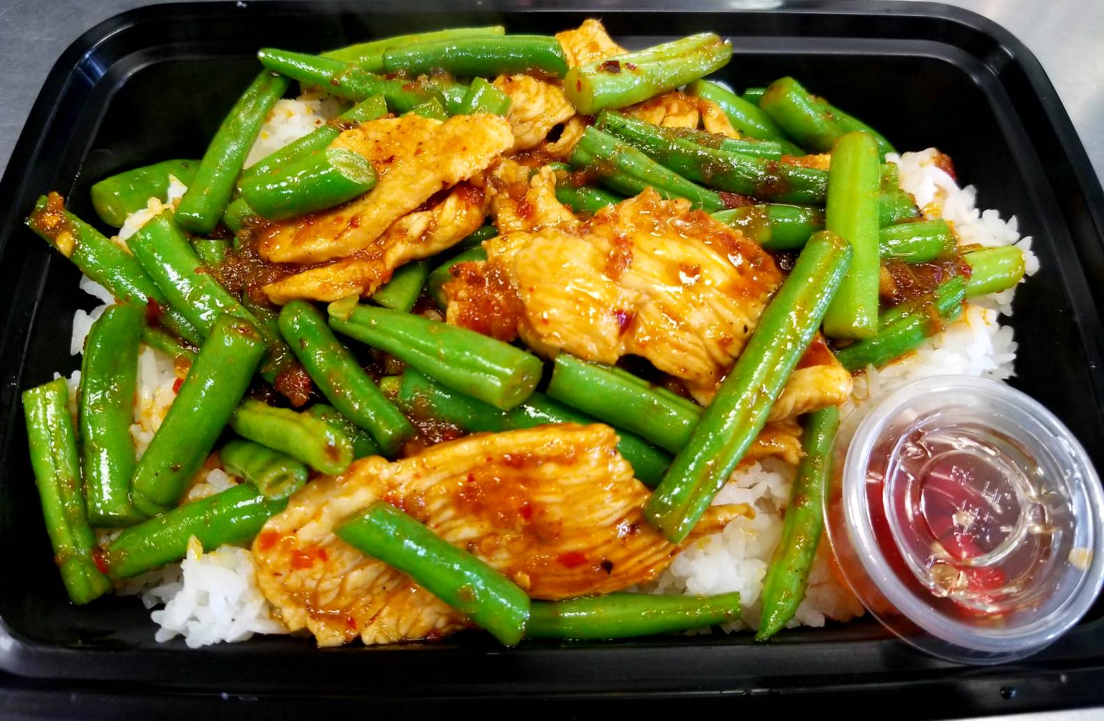 Order 31. Pad Prig Khing Over Rice food online from Sizzling Wok store, Long Beach on bringmethat.com