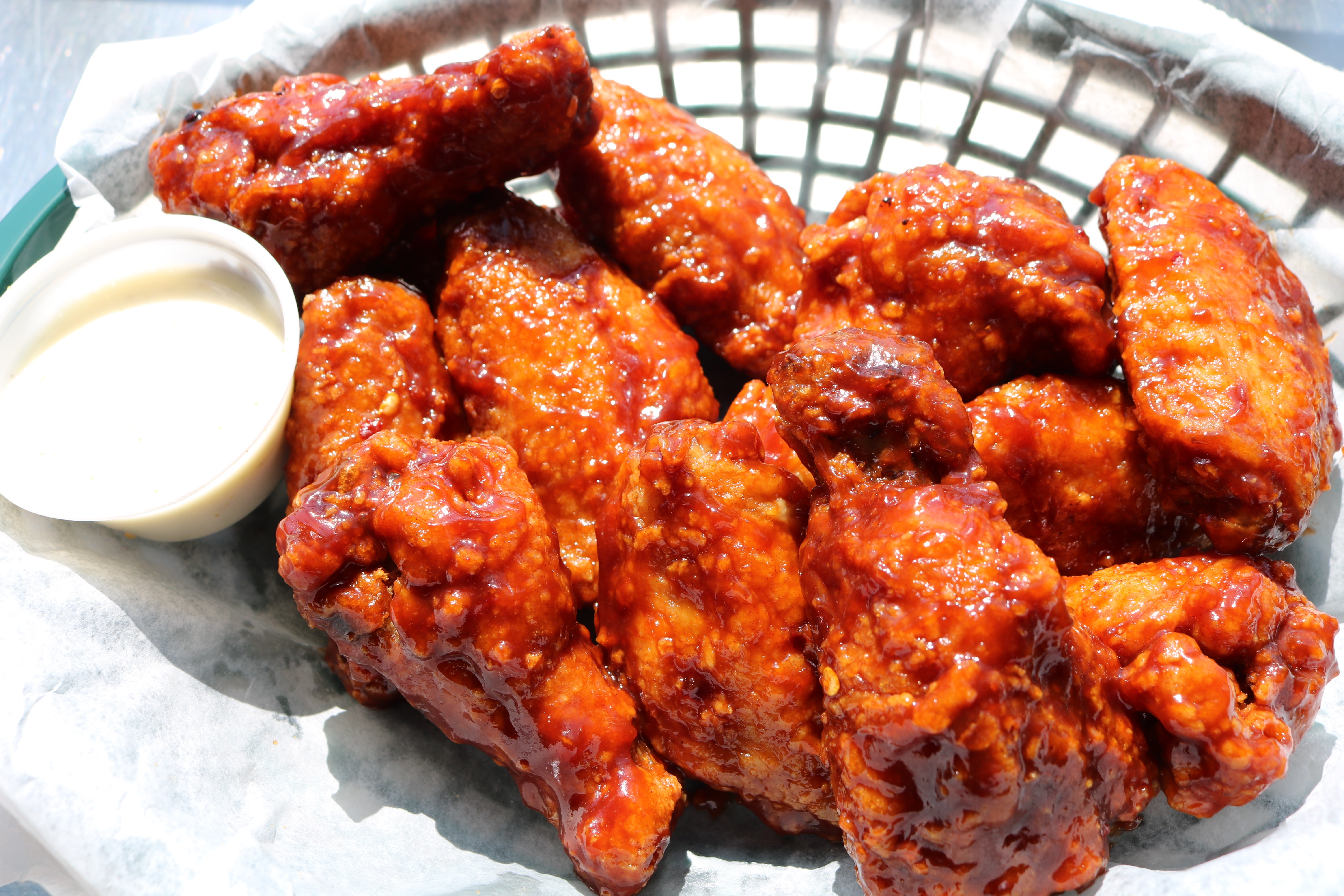 Order 12 Chicken Wings food online from Pizza Shuttle store, Milwaukee on bringmethat.com