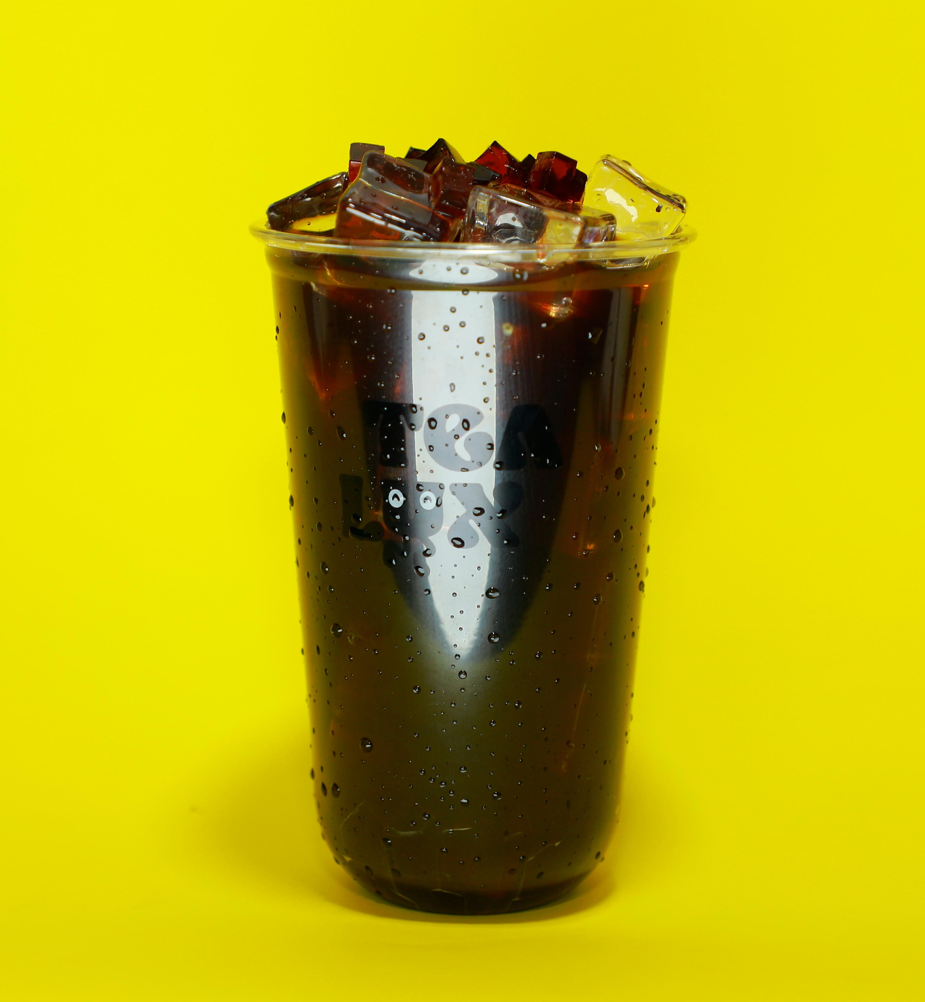 Order Black Iced Coffee food online from Tealux Cafe store, Norfolk on bringmethat.com