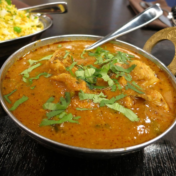 Order Chicken Curry food online from Tava Restaurant store, Morton Grove on bringmethat.com