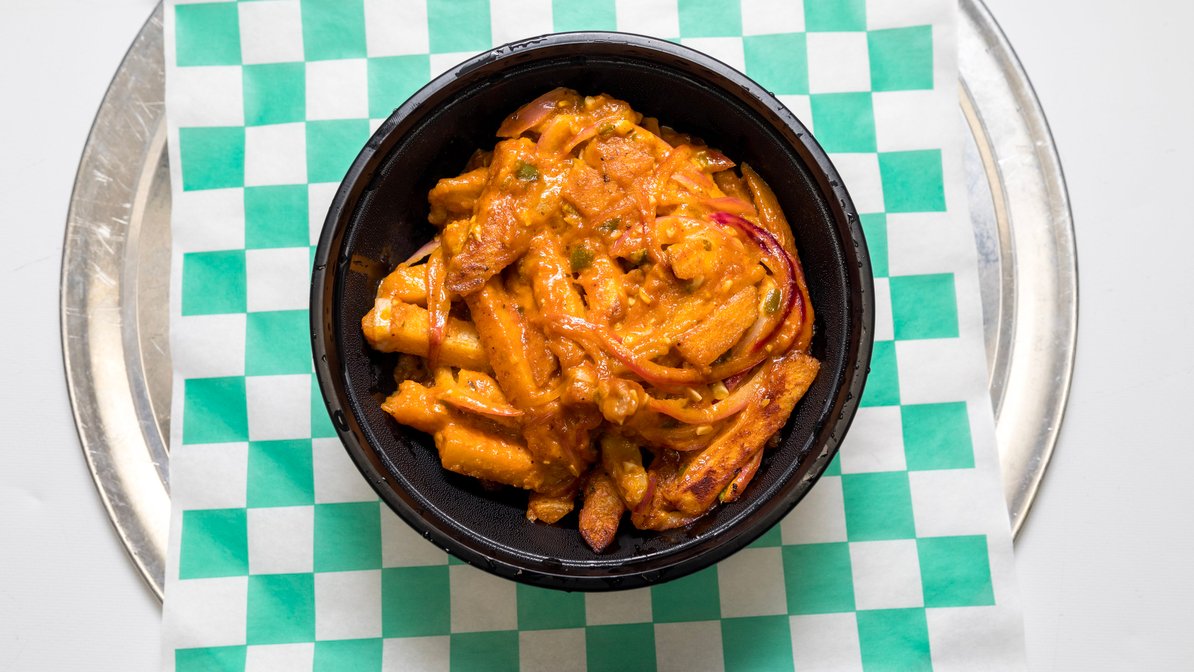 Order Masala Fries Twist food online from Chicago's Pizza With A Twist store, Arlington on bringmethat.com