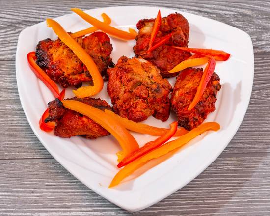 Order Tandoor Chicken food online from New Deshi Village store, Eagleville on bringmethat.com