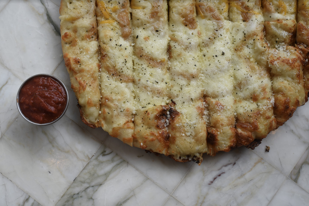 Order Cheesy Garlic Bread food online from Dimo's Pizza store, Chicago on bringmethat.com