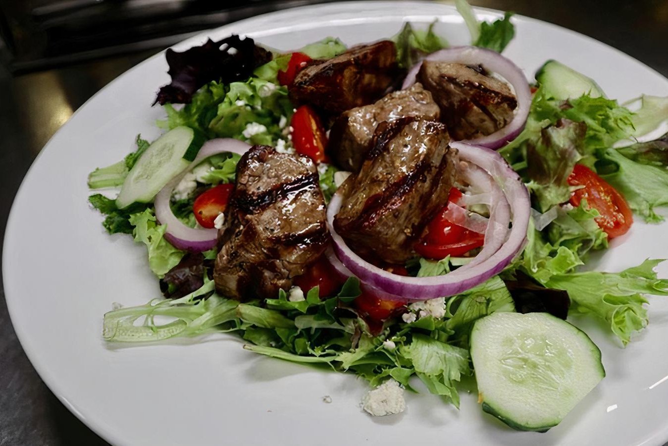 Order Steak Tip Salad food online from Charlies Pizza Cafe store, Allston on bringmethat.com