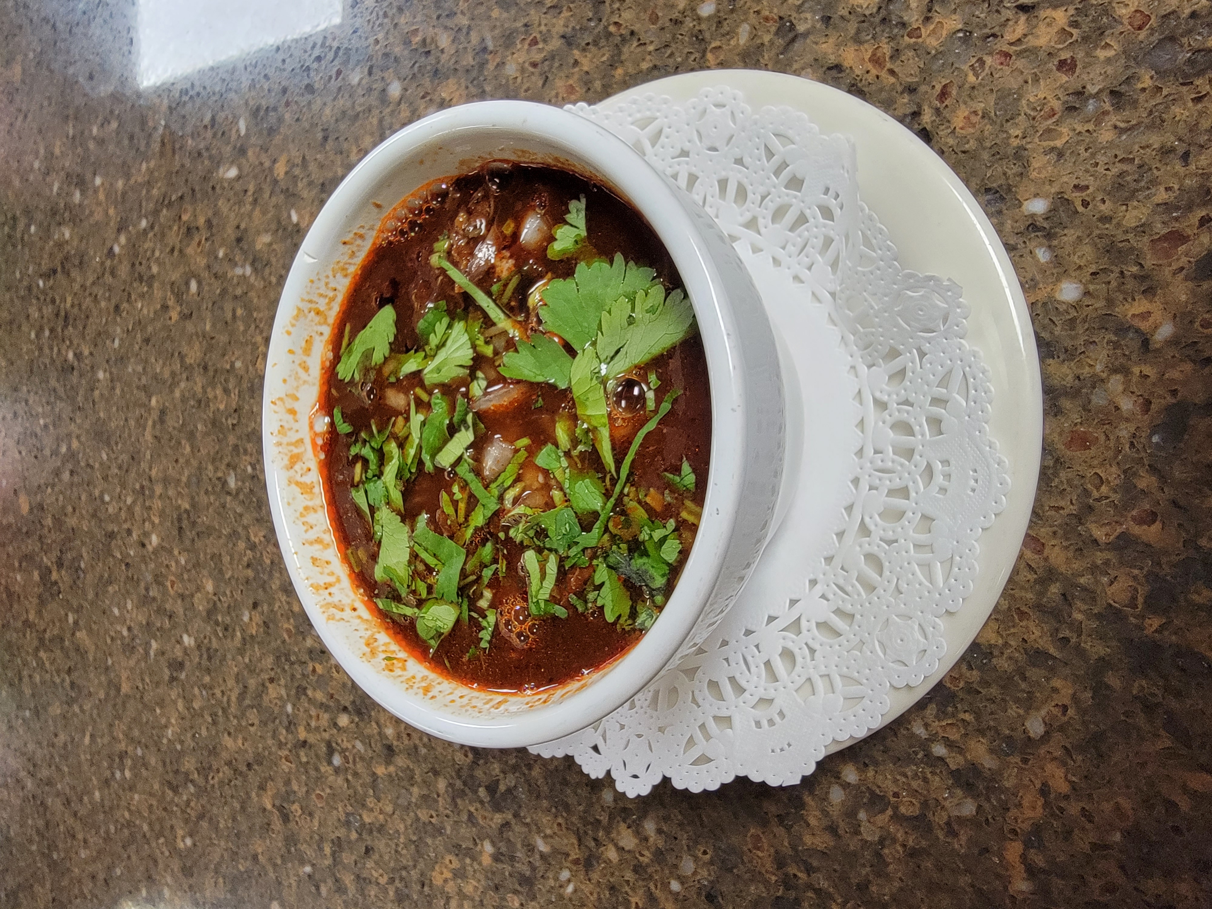 Order Consome (birria soup) food online from The Avocado Mexican Grill store, Runnemede on bringmethat.com