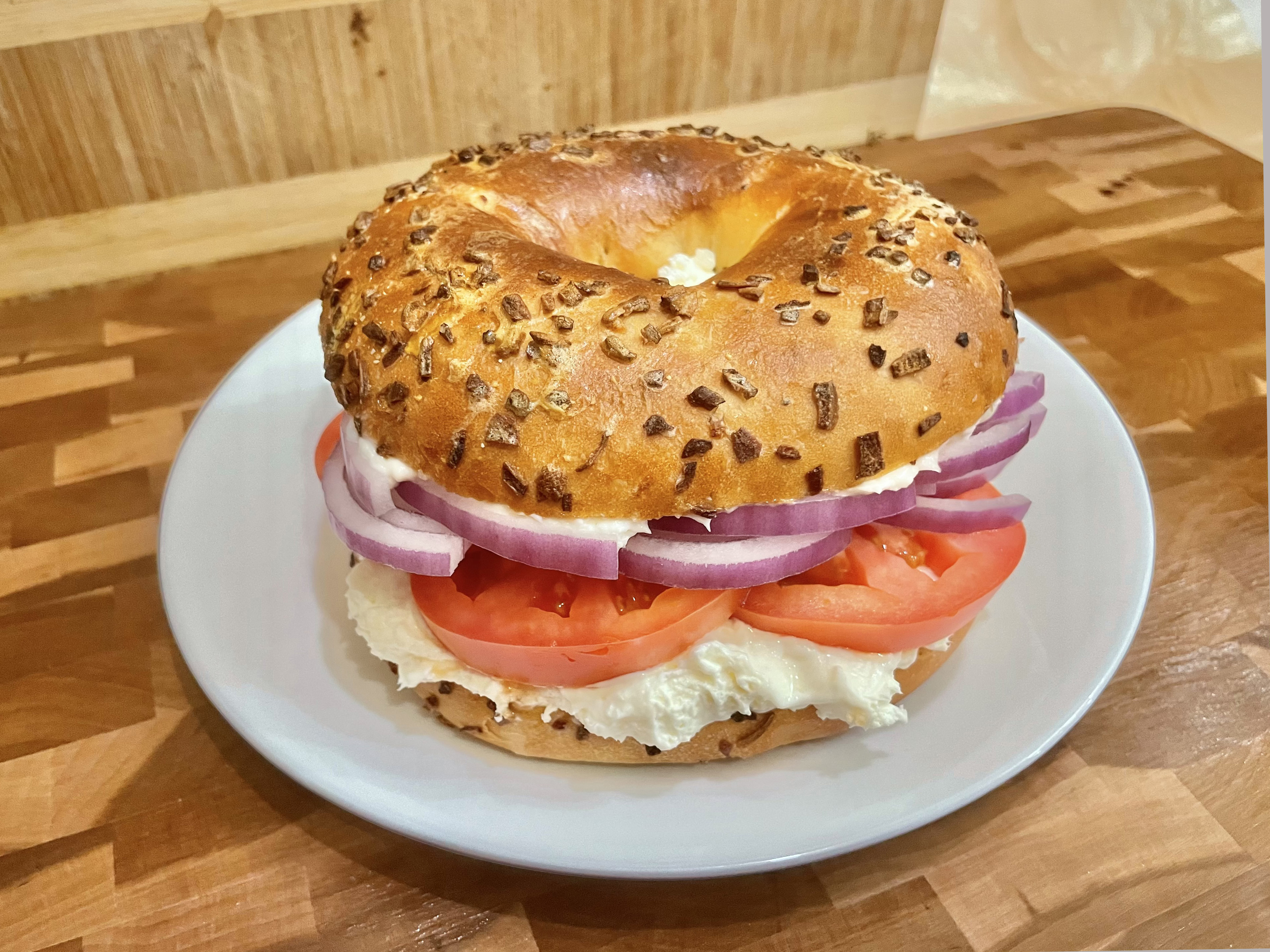 Order Bagel with Cream Cheese, Tomato and Onion Sandwich food online from Glaze Donuts And Bagel Sandwiches store, San Francisco on bringmethat.com