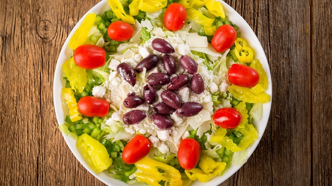 Order Greek Salad food online from Rascal House Pizza store, Maple Heights on bringmethat.com