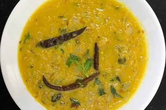 Order Daal Curry food online from Hot N Spicy Restaurant store, Irving on bringmethat.com