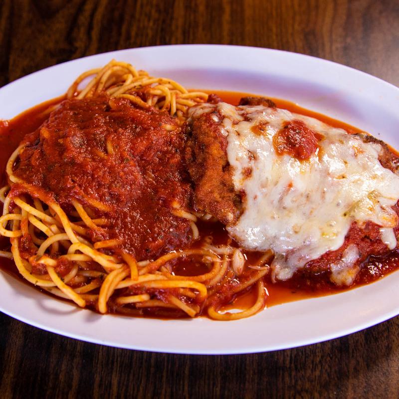 Order Chicken Parmigiana food online from Rico Pizzeria store, Englewood on bringmethat.com