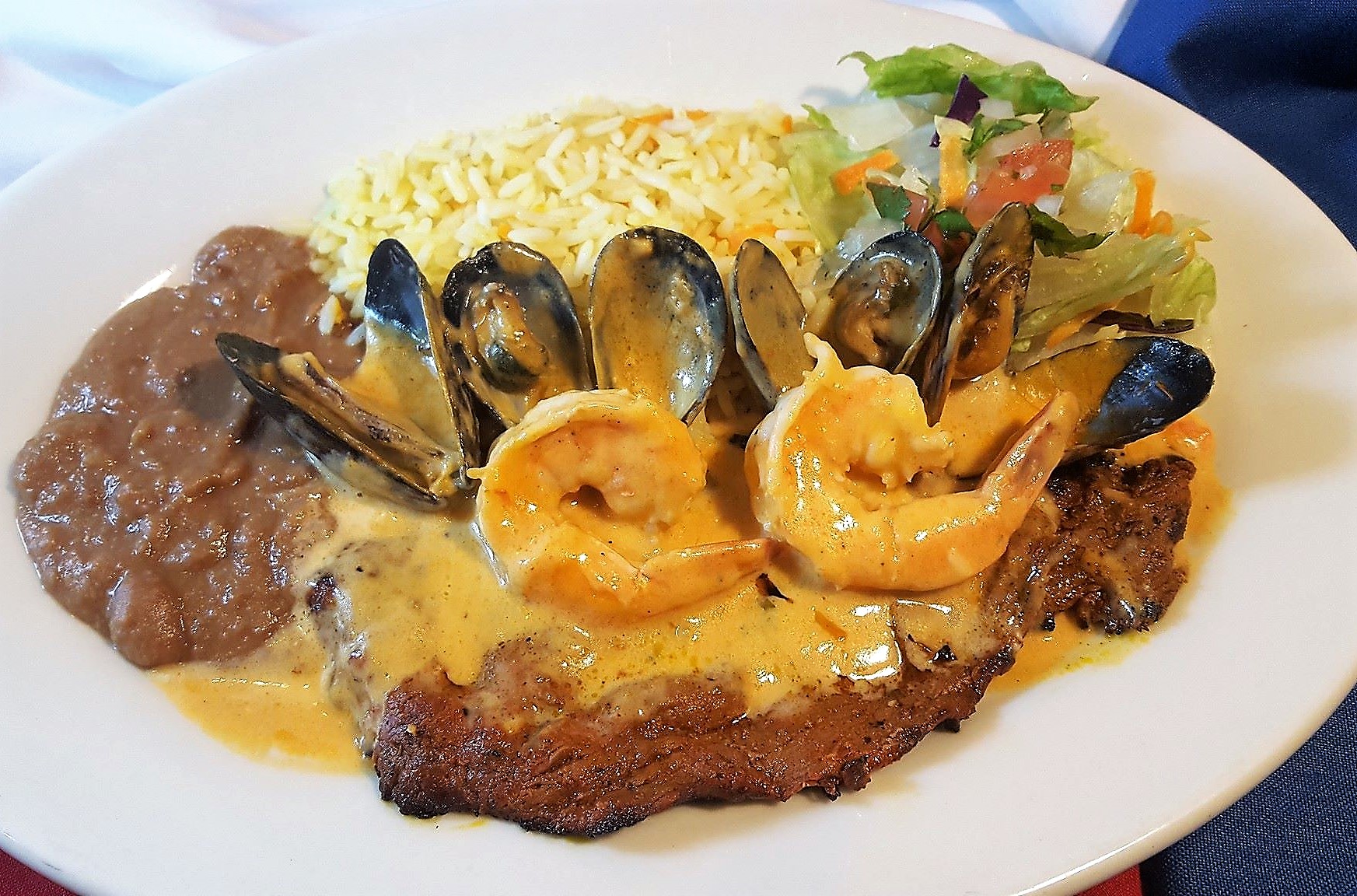 Order Mar y Tierra food online from El Pulgarcito Restaurant store, Alexandria on bringmethat.com