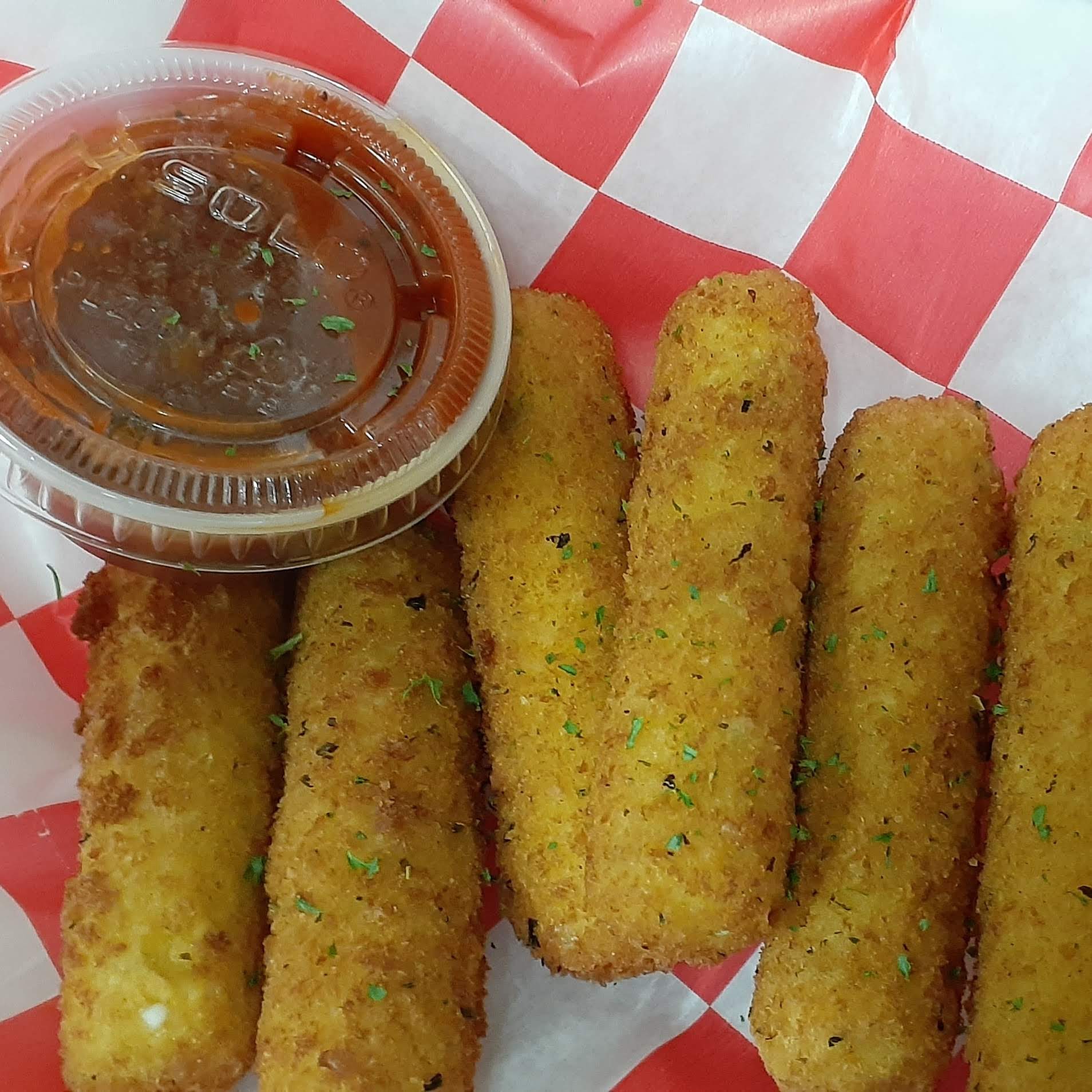 Order 9 pc mozzarella sticks food online from Crunch And Munch Take Out store, Bridgeport on bringmethat.com