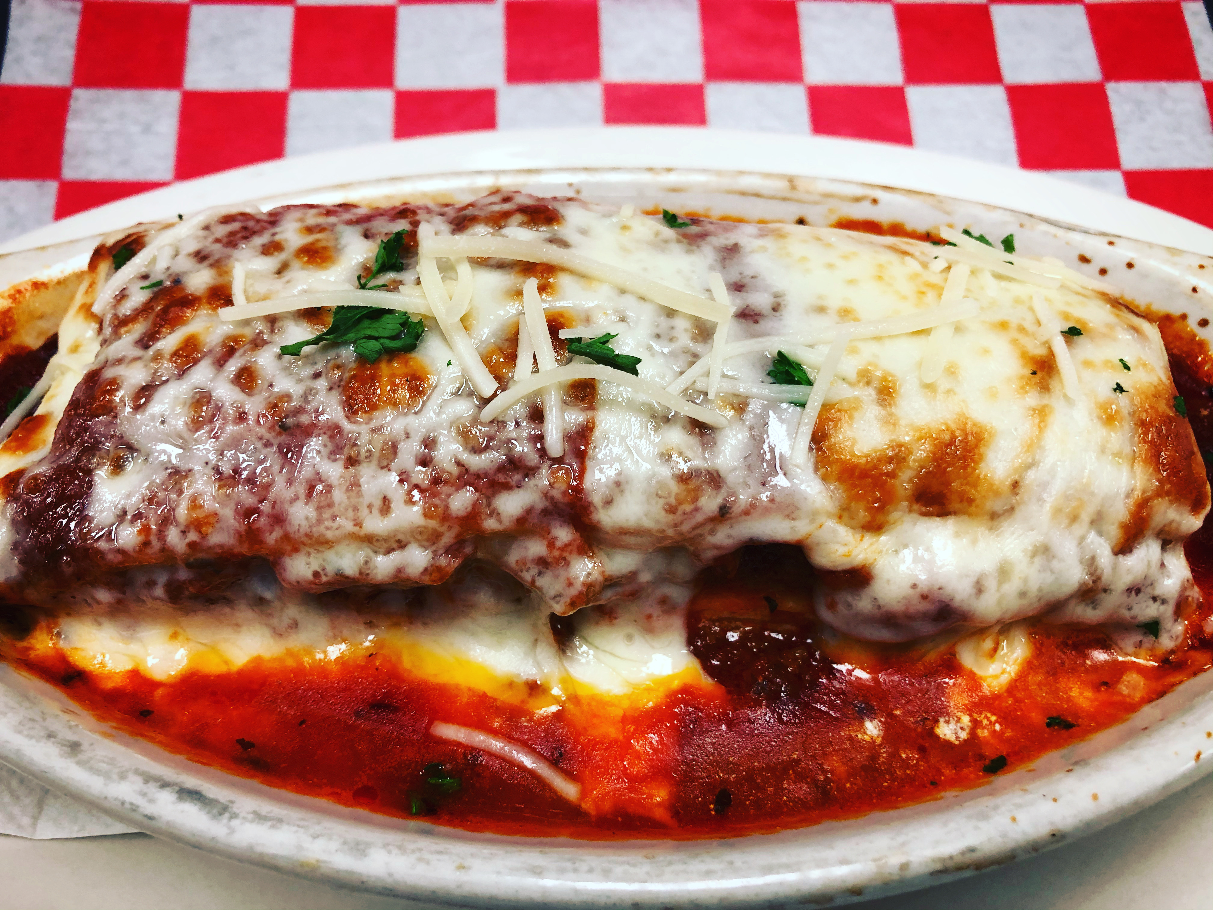 Order Lasagna Specialty food online from Vinny Italian Grill store, Fredericksburg on bringmethat.com