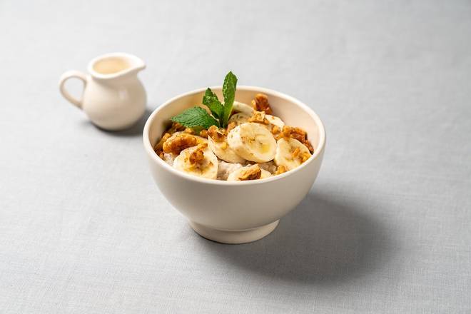 Order Organic Steel-Cut Oatmeal with Honey Walnuts and Banana food online from Le Pain Quotidien store, Greenwich on bringmethat.com