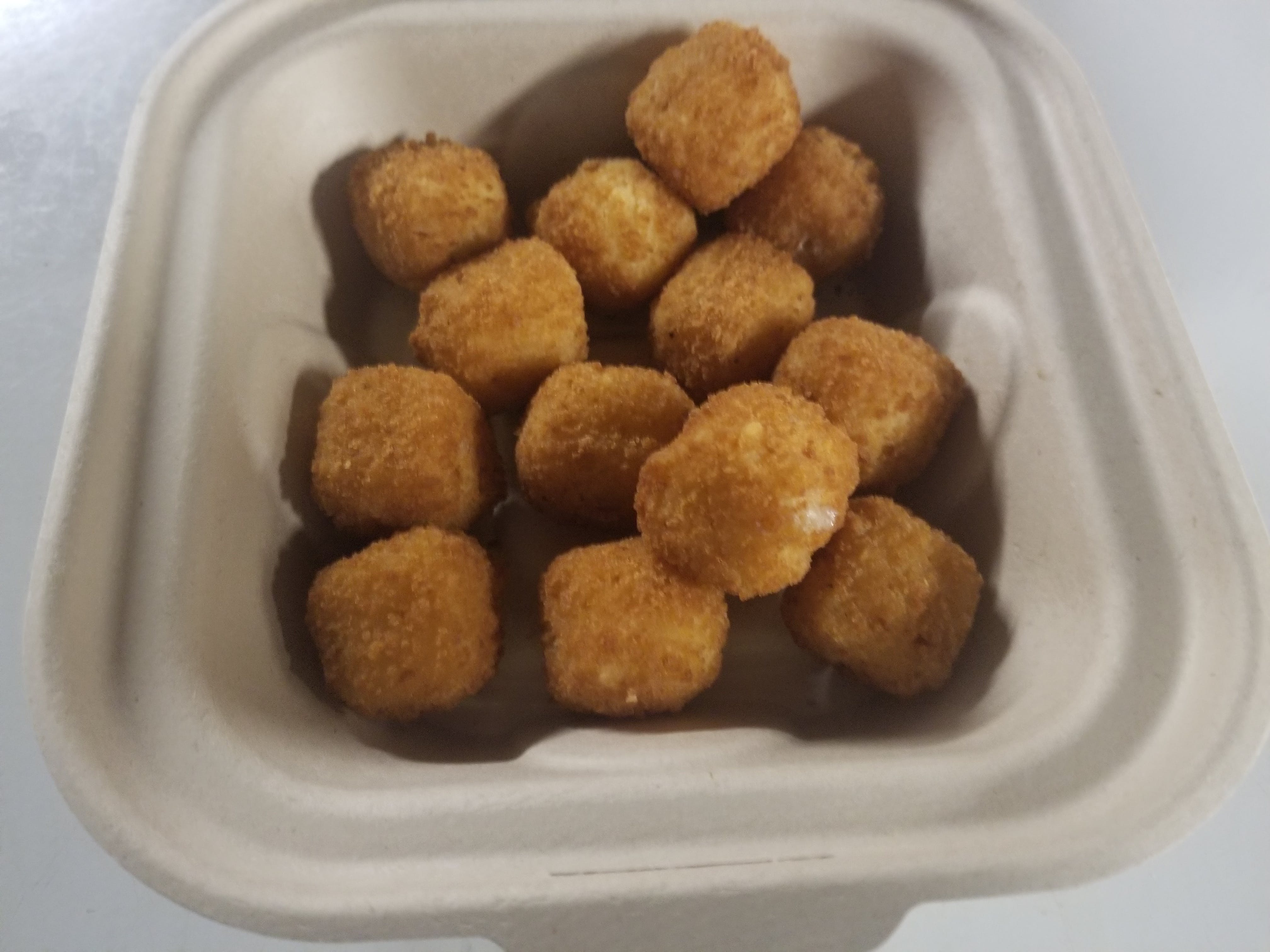 Order Cheddar Cheese Balls - Side food online from Novotny's Groceries & Pizza store, Worthington on bringmethat.com