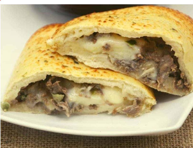 Order Steak Calzone - Calzone food online from Lunetta pizza store, New York on bringmethat.com