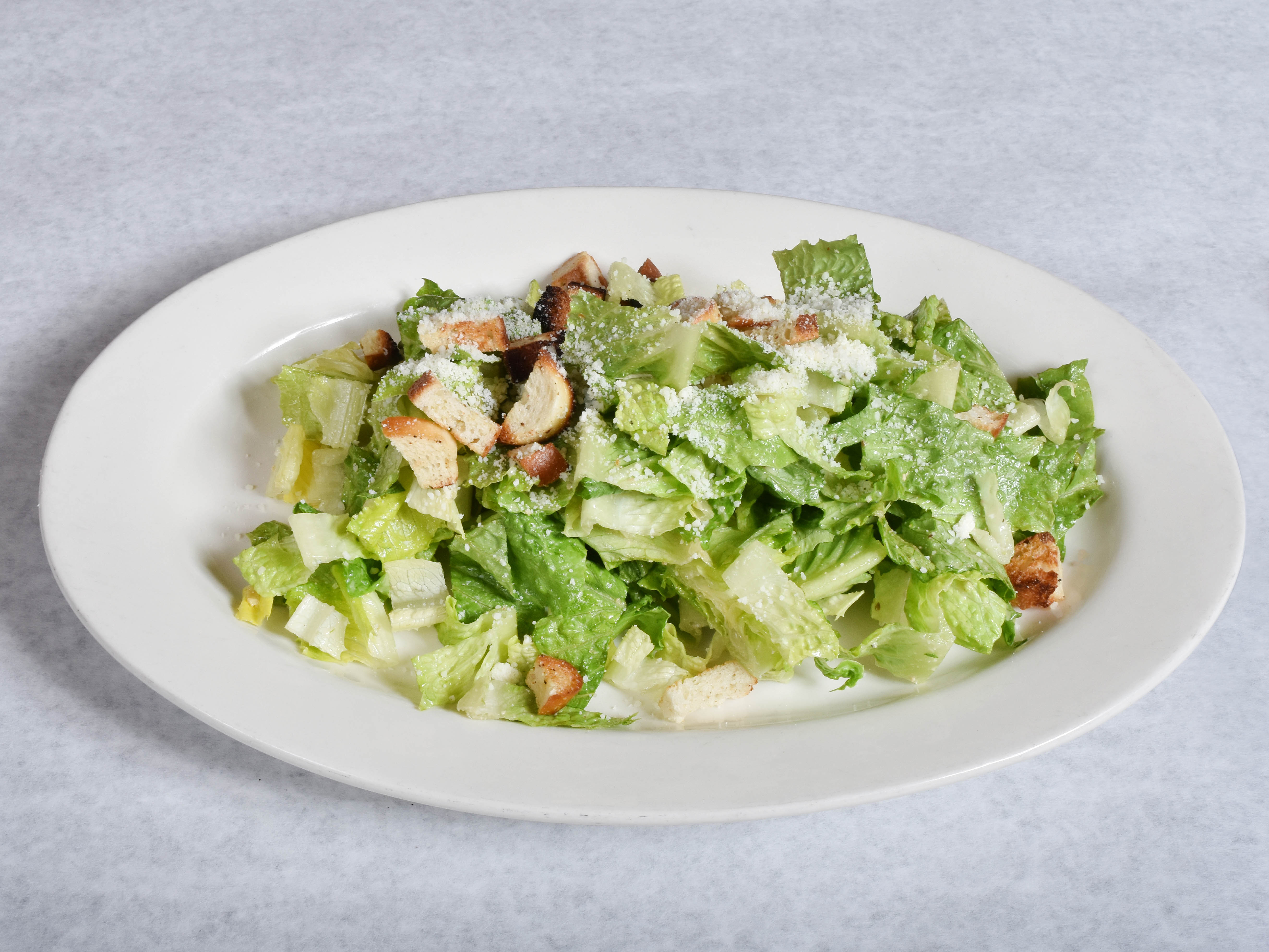 Order Classic Caesar Salad food online from Cafe Eats store, Stamford on bringmethat.com