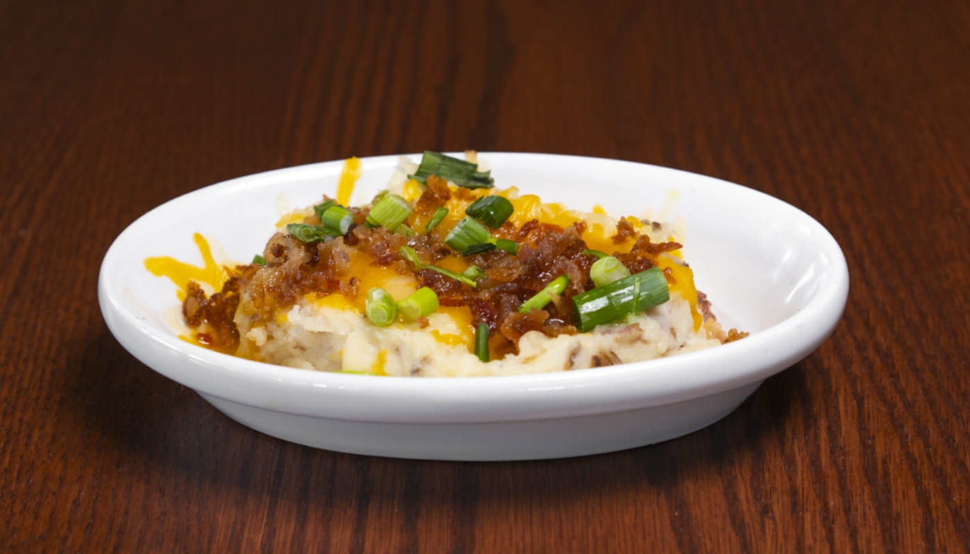 Order Loaded Mashed Potatoes food online from Smokey Bones Barbeque & Grill store, York on bringmethat.com