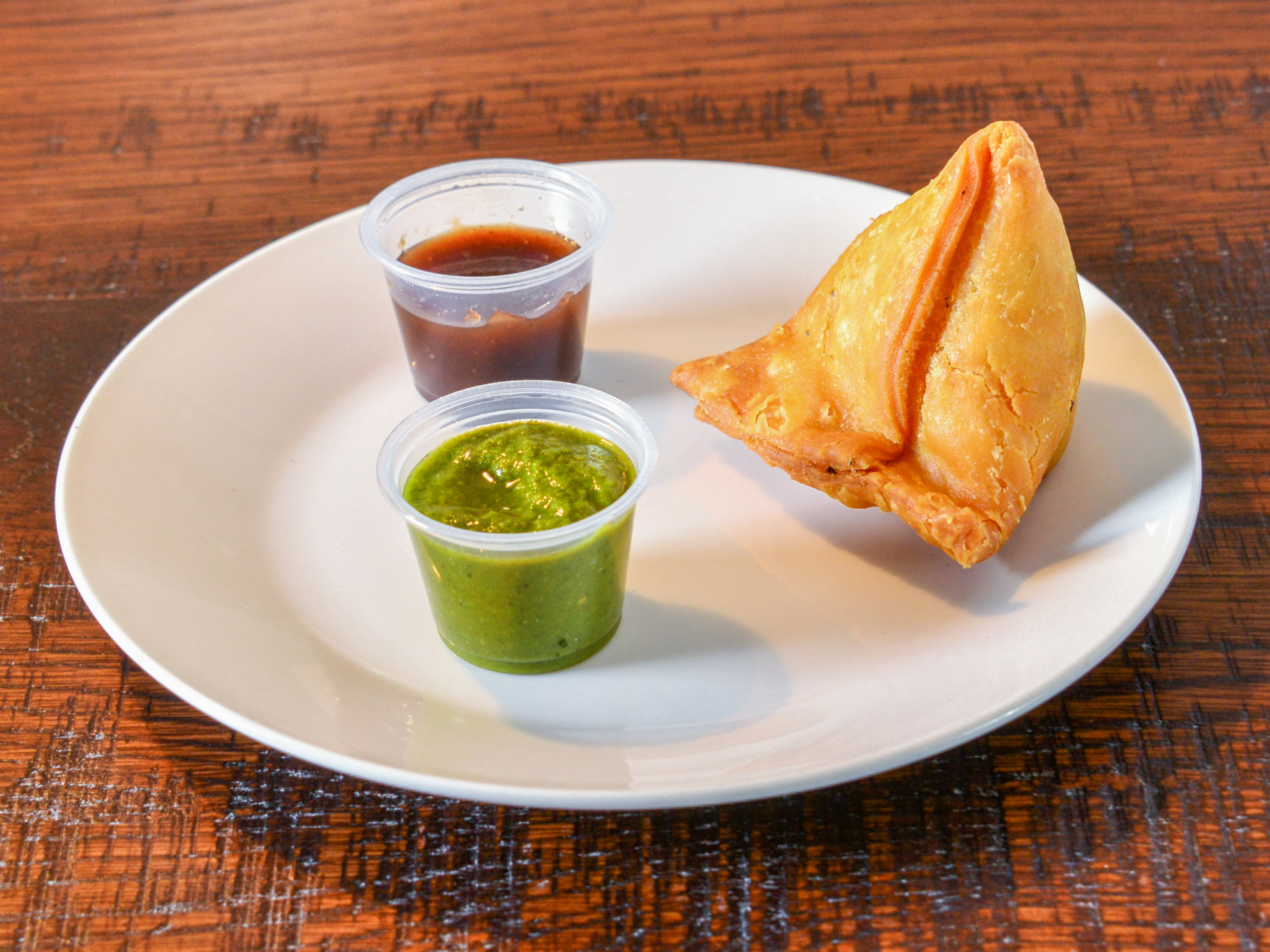 Order Samosa food online from Rollz Rice Indian Kitchen store, Lewis Center on bringmethat.com