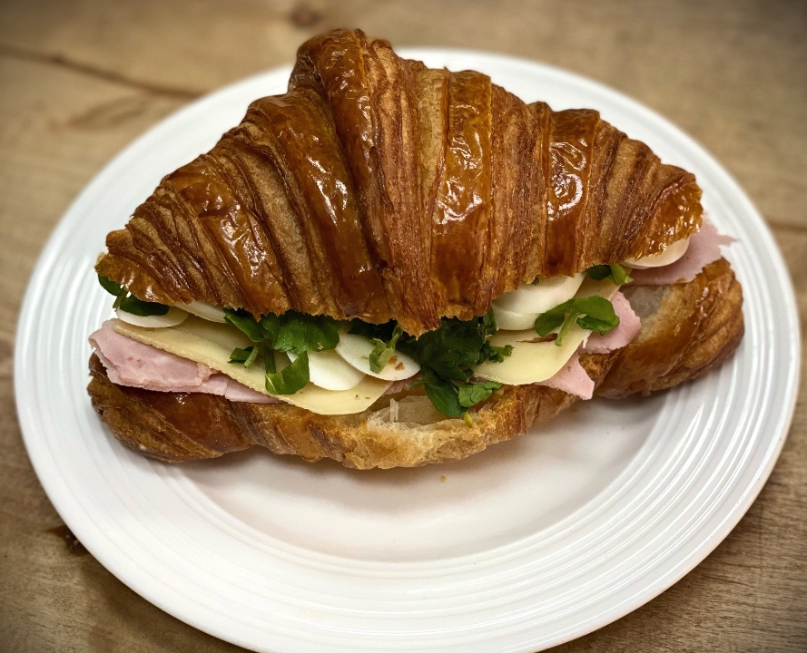 Order Ham & Egg Croissant Sandwich food online from Bread & Cie store, San Diego on bringmethat.com