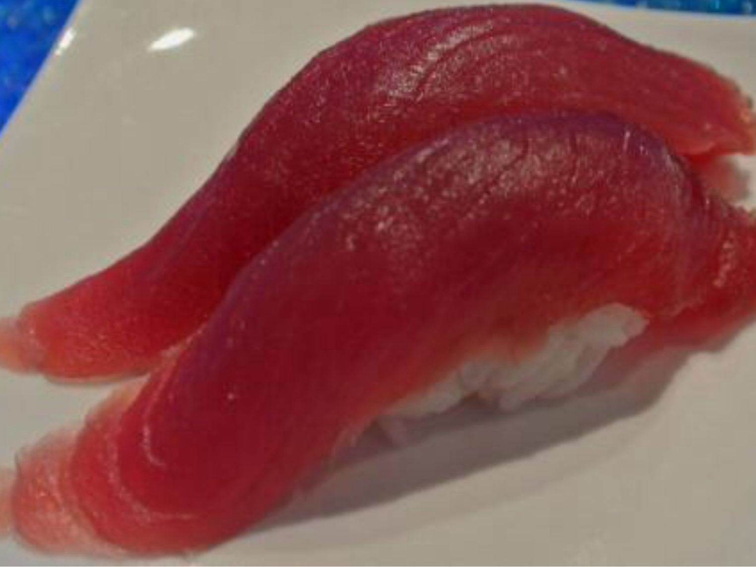 Order Tuna Sushi /Maguro (2pcs) food online from Roll Star Sushi store, Anaheim on bringmethat.com