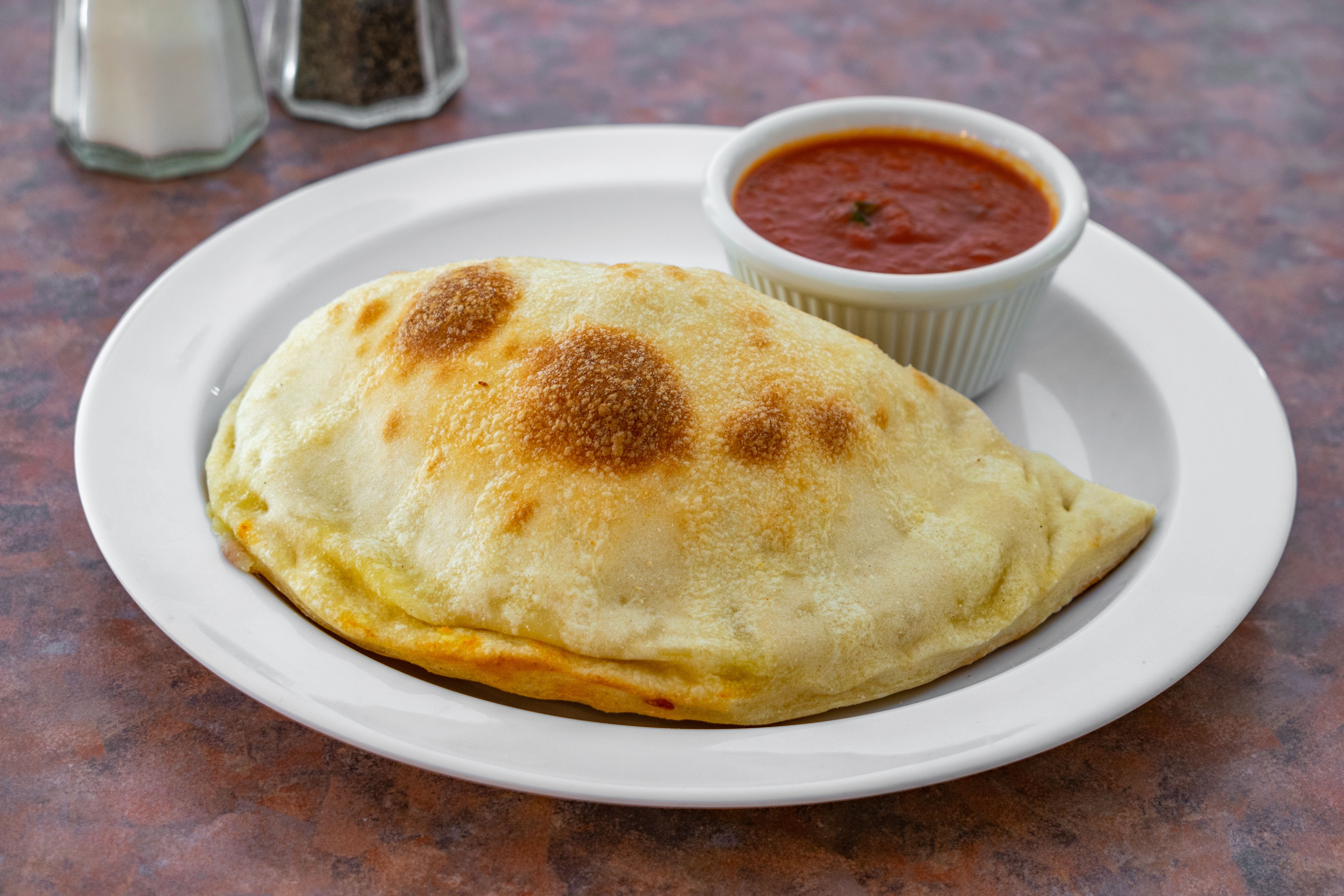 Order Cheese Calzone - Calzones food online from Mama Gourmet Pizza store, Roselle on bringmethat.com