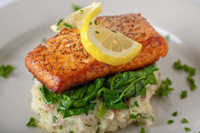 Order Wood-Fired Norwegian Salmon* food online from Pita Jungle store, Chandler on bringmethat.com