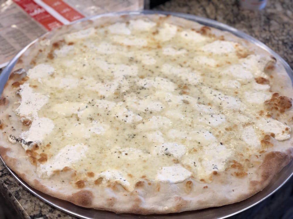 Order White Pizza - Individual 10'' (4 Slices) food online from Nonna's Pizzeria store, Wappingers Falls on bringmethat.com