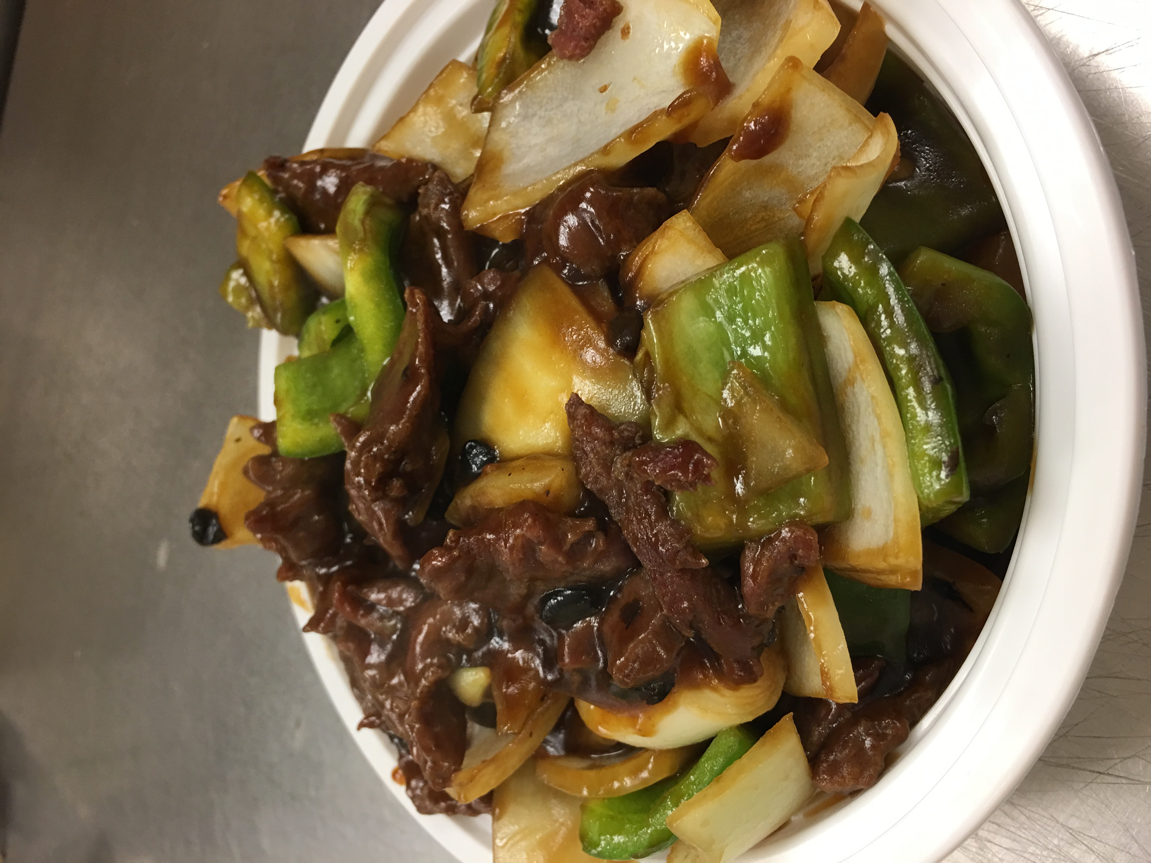 Order 403. Pepper Steak  ( Large ) food online from China China store, Joliet on bringmethat.com