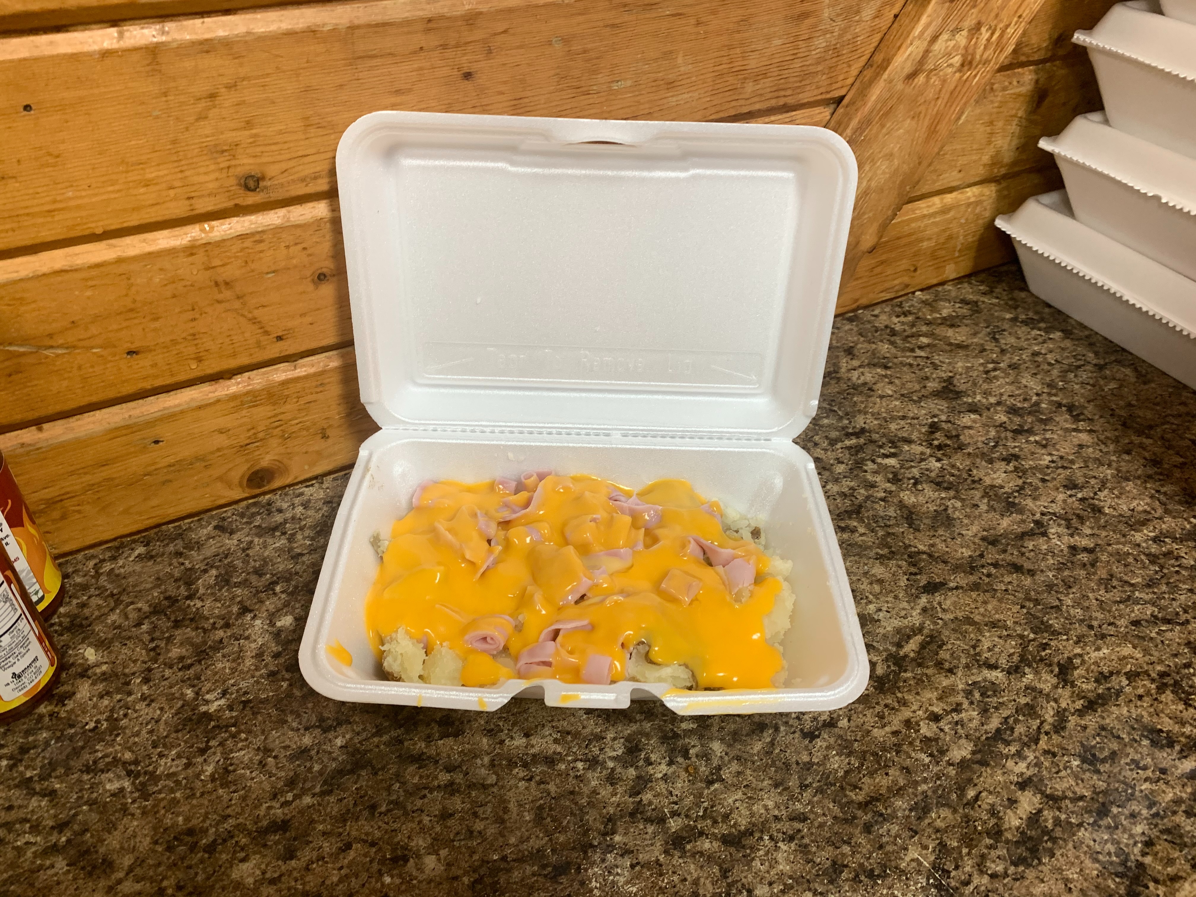 Order 31. Ham & Melted Cheddar Cheese Potato food online from Lieber Boxcar Express store, Galesburg on bringmethat.com