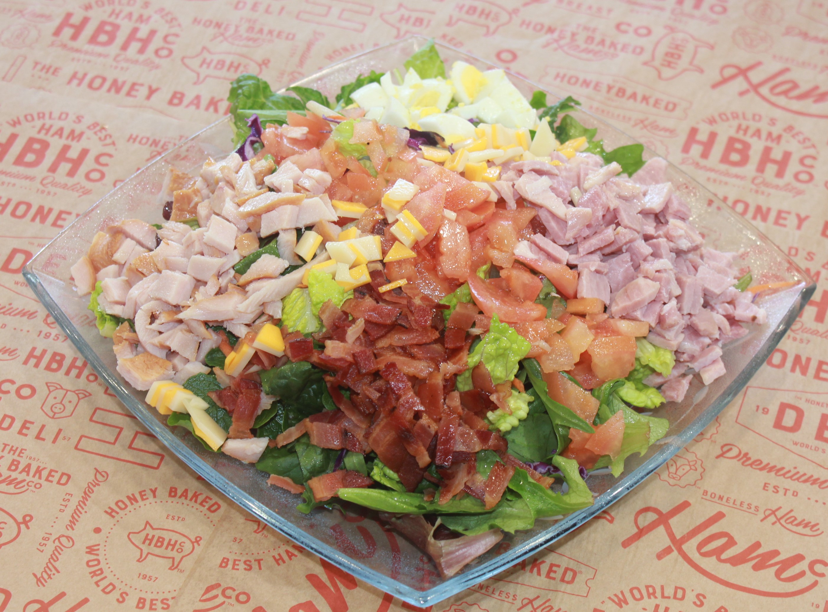 Order Cobb Salad  -  460 cal food online from The HoneyBaked Ham Company store, Orange on bringmethat.com