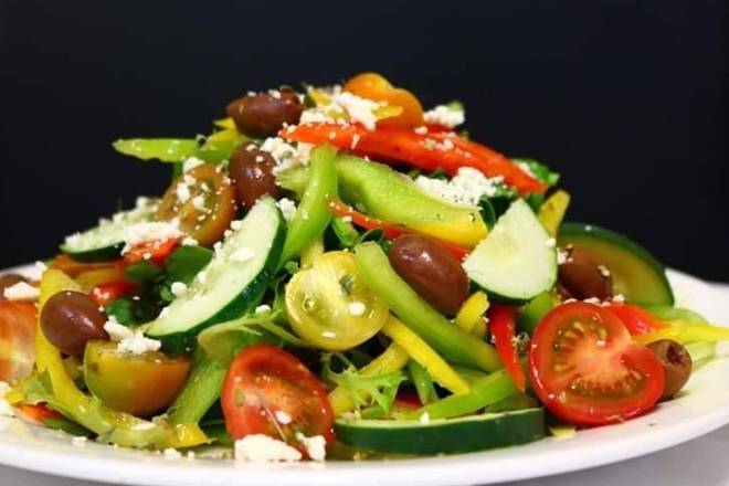 Order Greek Salad food online from 8th Street Deli store, National City on bringmethat.com