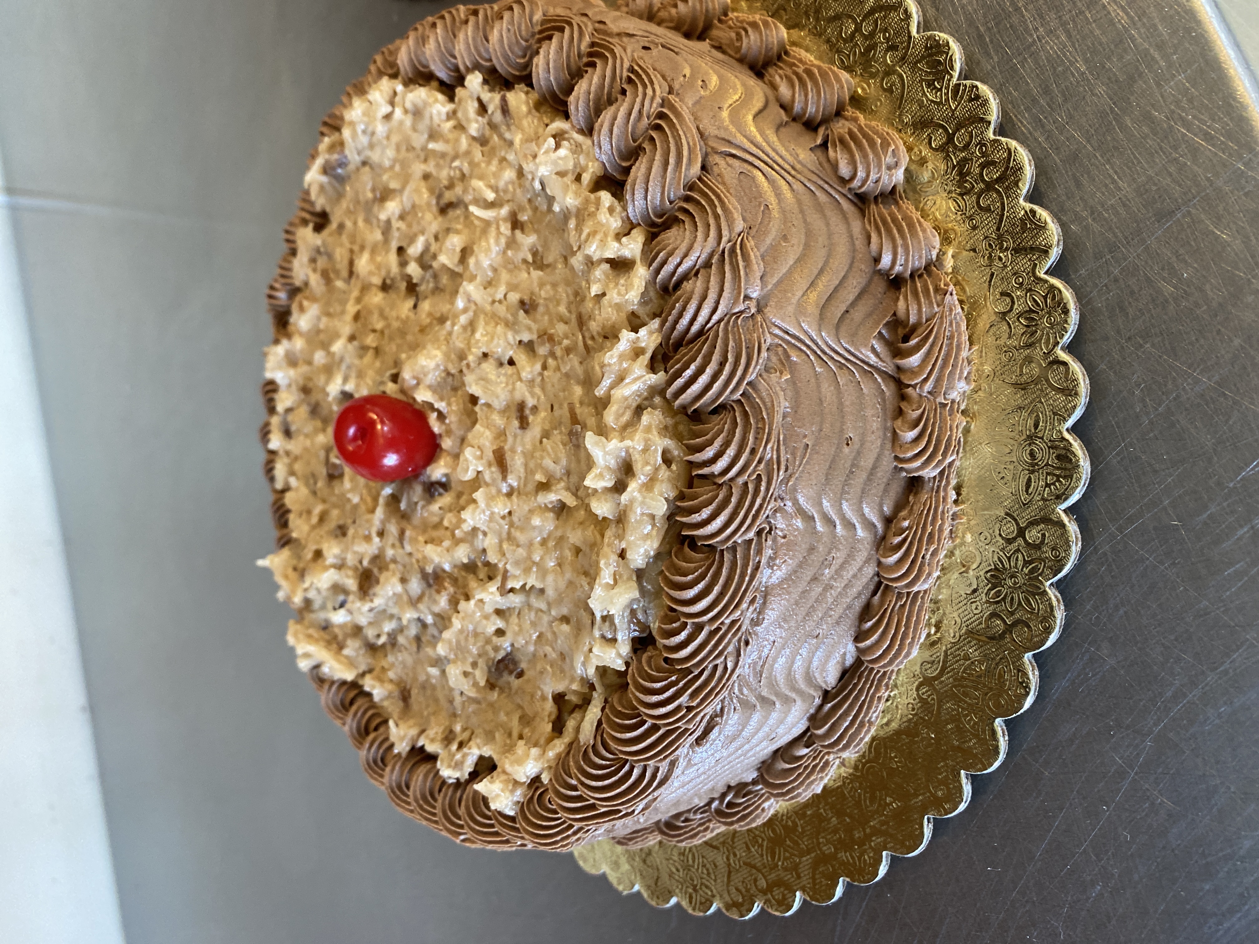 Order German Chocolate Cake -8 inch  food online from French Bakery store, Mission Viejo on bringmethat.com