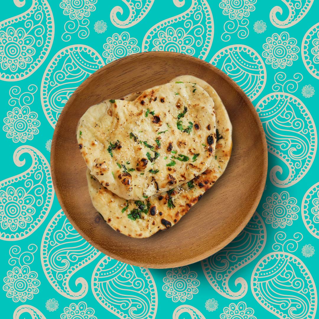 Order Go Garlic Naan  food online from Curry Empire store, Frisco on bringmethat.com