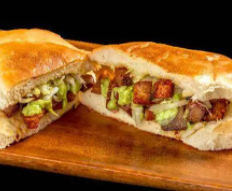 Order Carnitas Torta food online from Filiberto Mexican Restaurant store, Surprise on bringmethat.com