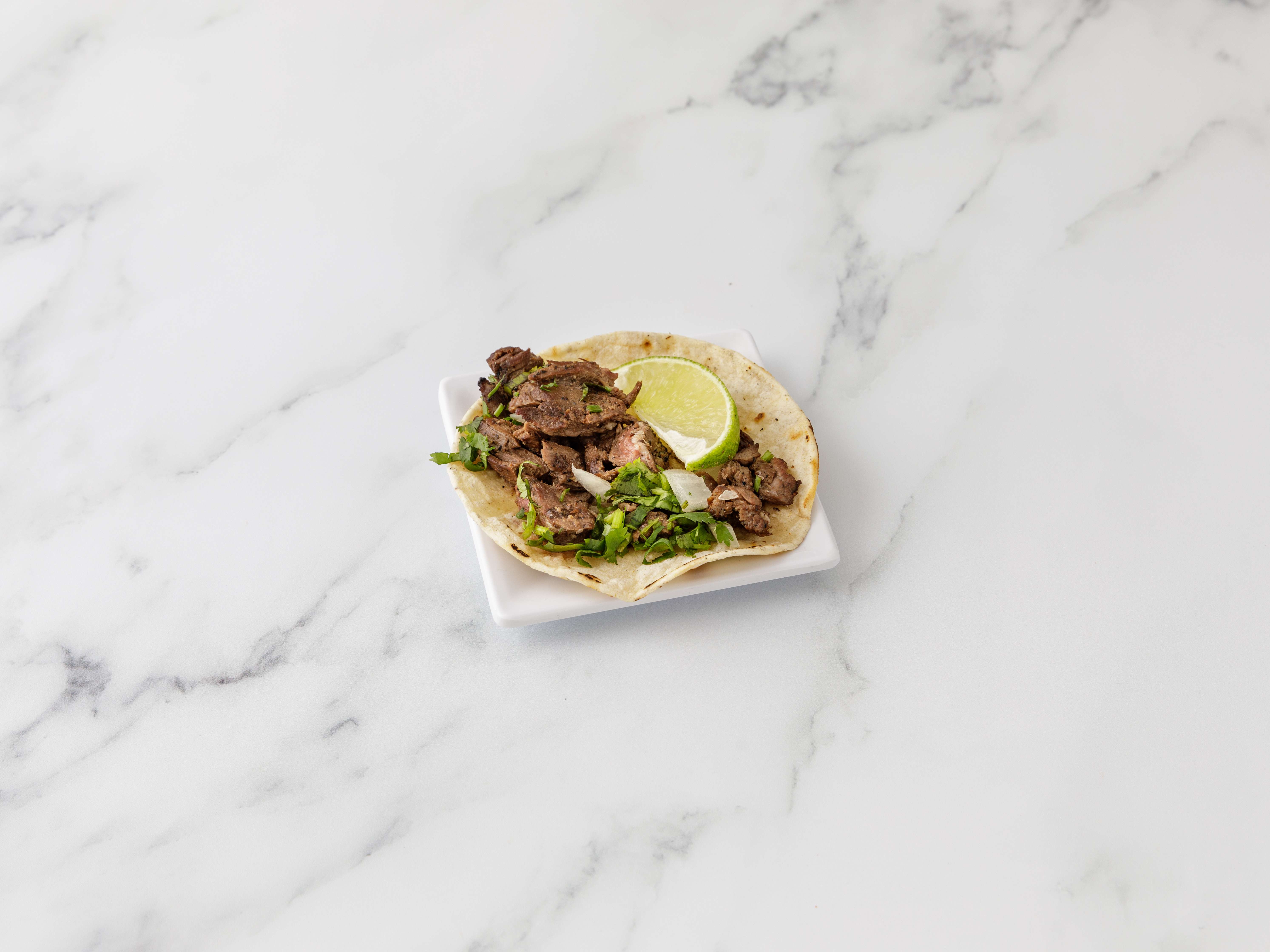 Order Steak Taco food online from The taco shop store, New York on bringmethat.com
